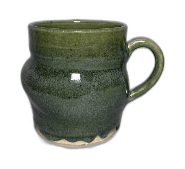 A second green-glazed mug photograph from the studio
