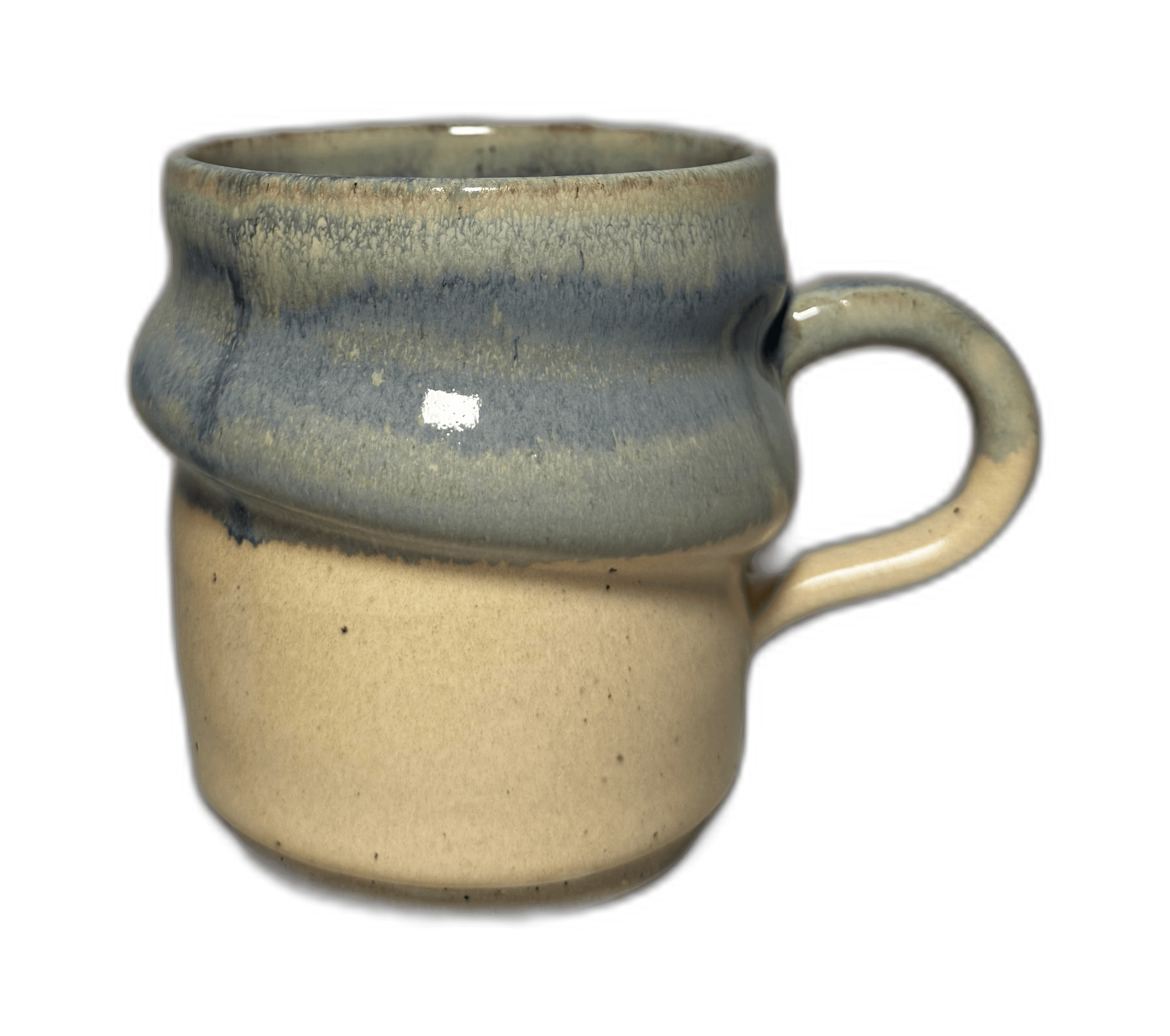 A softly glazed mug photographed in the Solan Studios workspace